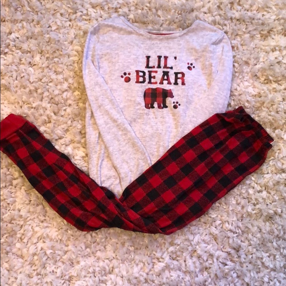 Pants and long sleeve shirt children pajamas.